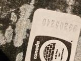 a black and white photo of a credit card on the ground