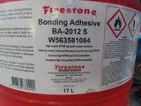a close up of a red gas can with a sticker on it