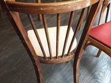 two chairs that are sitting next to each other