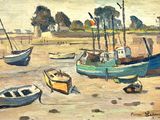 many boats that are sitting in the sand