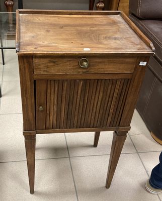 a small wooden table with a drawer on top of it
