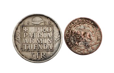 une vieille pièce d'argent sur laquelle figure l'effigie d'un homme