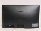 a picture of a black samsung monitor on a white surface