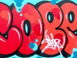 a painting of the word boo on the side of a building