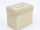 a small box that is sitting on a white surface