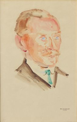 portrait d'un homme en costume avec une cravate verte
