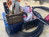 an image of a box of tools and a hose