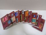 a bunch of books that are open on a table
