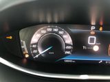 a close up of a car ' s dashboard with a speedometer