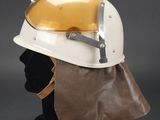 an image of a helmet on a mannequin head on a black surface