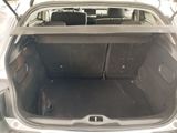 a trunk of a car with the back seats folded down