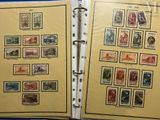 an open book with a lot of different stamps on it