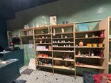 a room with shelves and shelves filled with various items