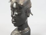 statue of a man with a crown of thorns on his head