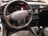 dashboard of a car with a steering wheel and dashboard controls