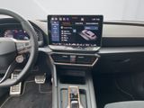 the interior of a car with a steering wheel, dashboard, and a touch screen