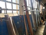 many pieces of wood that are sitting in a room