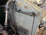 a close up of a car ' s radiator and radiator cover