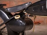 a close up of a motorcycle with a side view mirror