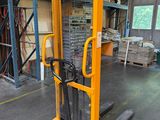 an image of a forklift truck in a warehouse