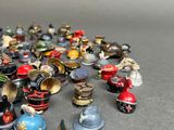 a pile of miniature figurines sitting on a table