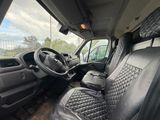 a view of the inside of a truck with the driver ' s seat up