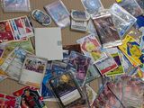many different types of pokemon cards on the table