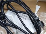 a black cord that is connected to a computer mouse