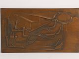 relief of a plane and tools on a brown plaque
