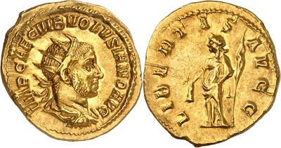 a gold coin with an image of a man holding a sword