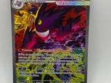 gros plan d'une carte pokemon sur une surface blanche