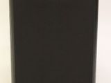 an image of a close up of a speaker on a white surface