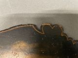 a close up of a piece of art on a table