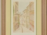 an image of a painting of a narrow street in a wooden frame