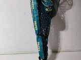 a woman that is standing with a net on her back