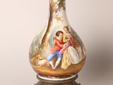 a lamp that has a picture of a woman and a child on it