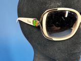 a close up of a mannequin head with a pair of sunglasses on it