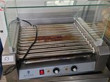 an image of a hot dog grill on a counter top