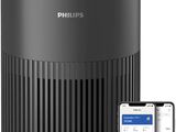 Le purificateur d'air Philips est présenté à côté d'un iPhone