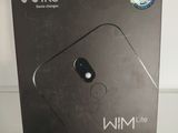 a close up of a box with a wii remote in it