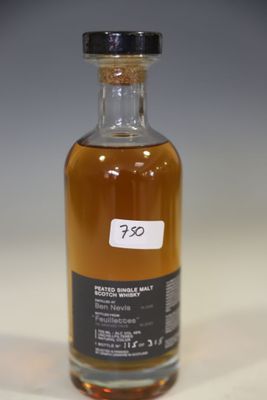 a bottle of alcohol that is sitting on a table