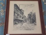 une photo représentant un tableau accroché au mur au-dessus d'une cheminée