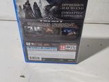 a close up of a video game on a table with a blurry background