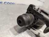 an image of a close up of a gun on a table