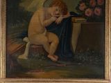a picture of a painting of an angel on the wall