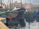 many boats that are docked in the water