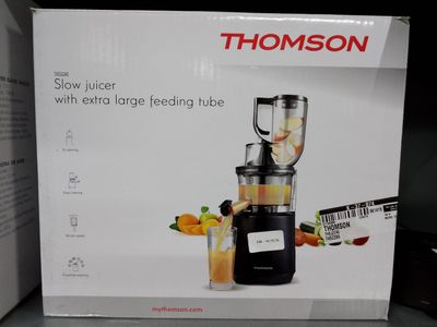 une boîte sur laquelle figure l'image d'un extracteur de jus