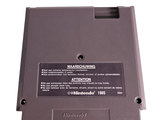 a close up of a nintendo game system on a white surface