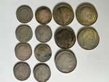a lot of coins that are sitting on a table