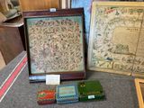 a picture of a collection of old books on a table